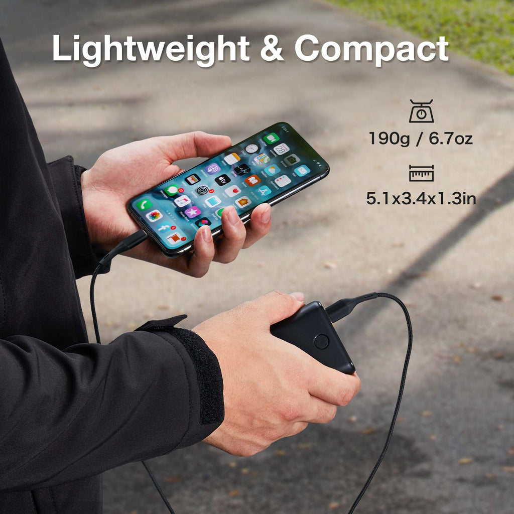  holding a mobile phone, TideWe Power Bank, featuring dual input/output for fast charging and safety certifications.